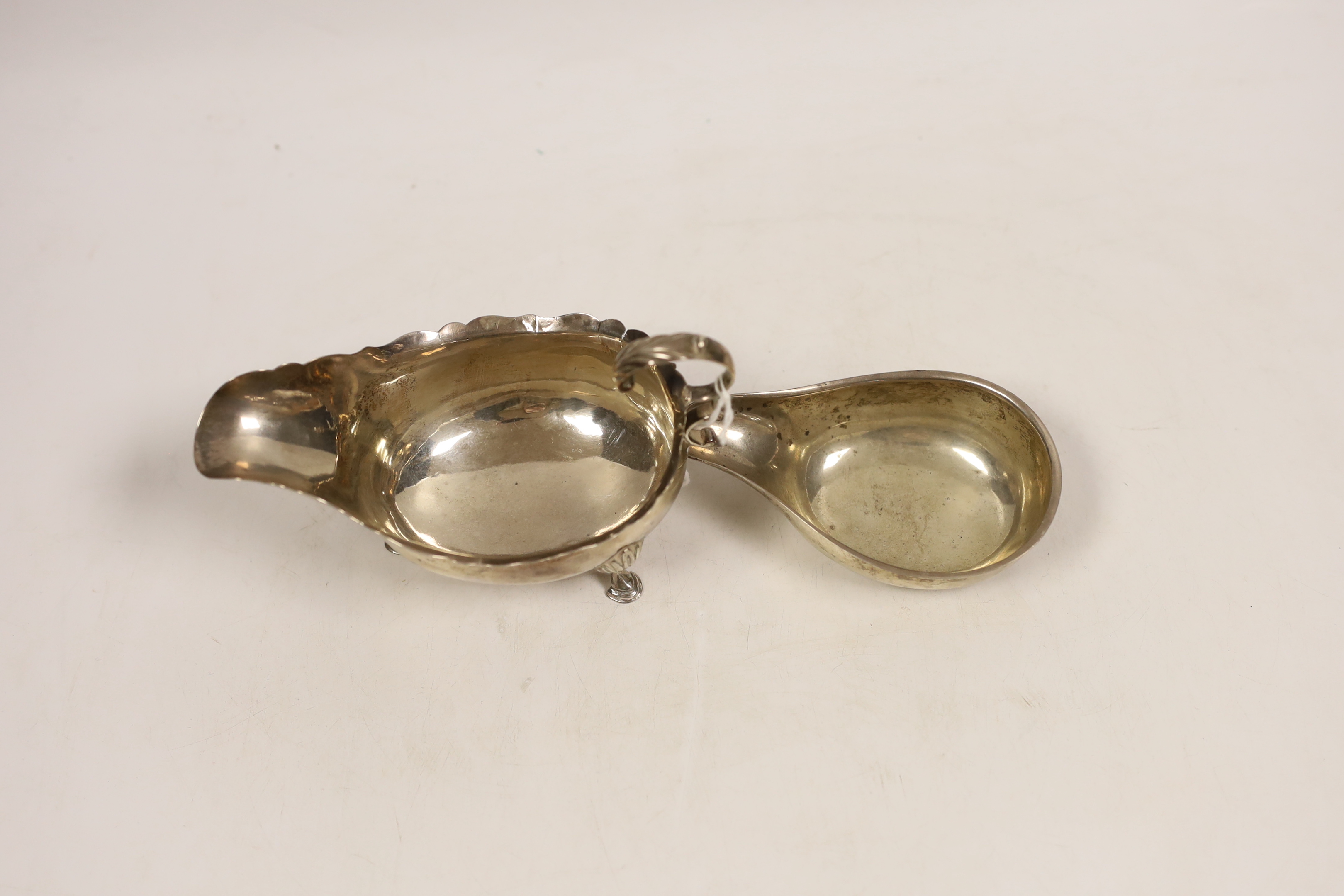 A George III silver sauceboat, by Peter, Ann & William Bateman, London, 1802, length 14.5cm (splits) and a George III silver pap boat, London, 1791.